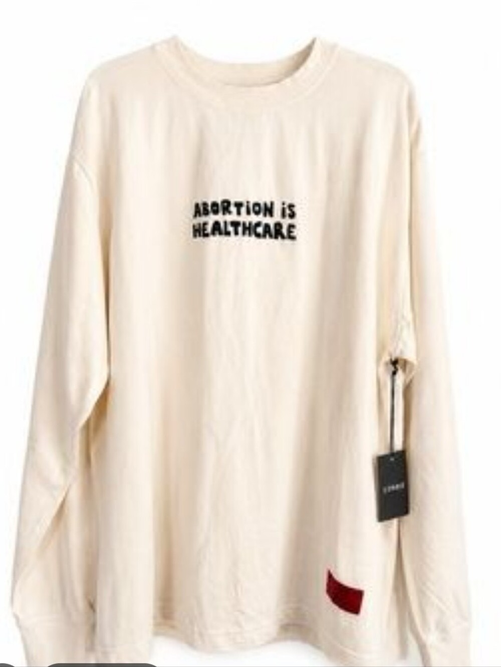 CHNGE Cream Graphic Crewneck Long-Sleeve Tee with Red Accent